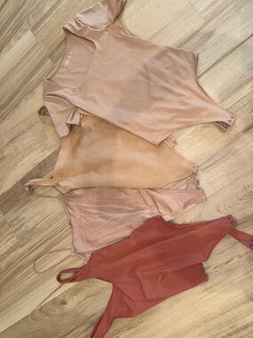 Abercrombie & Fitch Women’s Ribbed Tank Bodysuits in Rust, Blush, Tan, and Nude